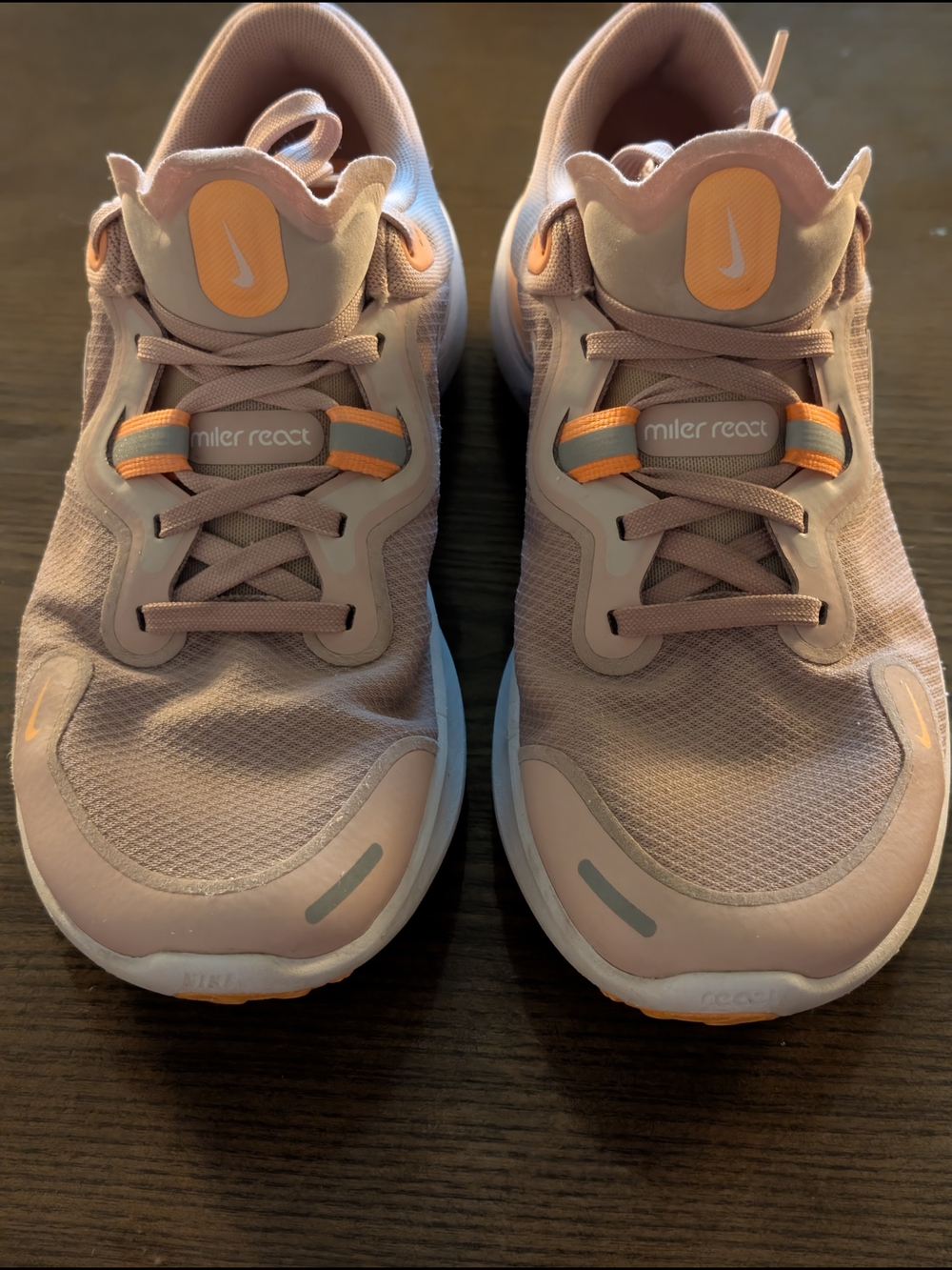 Nike Women’s React Running Shoes in Peach with Orange Highlights